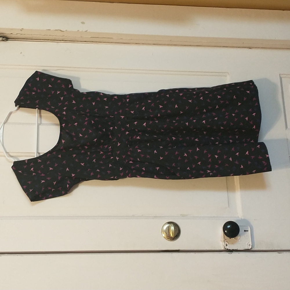 Angie size S black short sleeve dress w/ pink pattern and criss cross open back